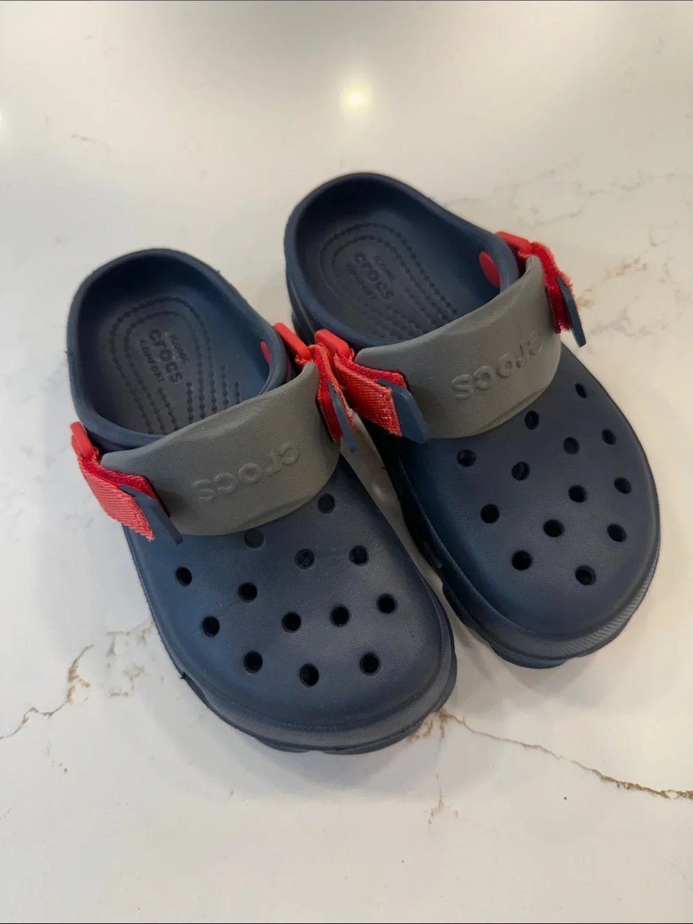 CROCS Kids Navy Clogs with Gray Heel Strap and Red Accents